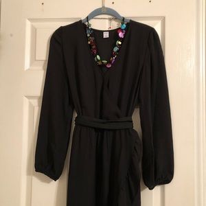 Black dress with ruffled hem